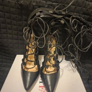 Size 7.5 knee high tie up stilettos.